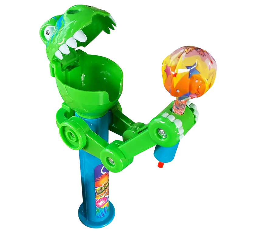 Grünes Spielzeug in Form eines Dinosauriers, der einen Lutscher hält.